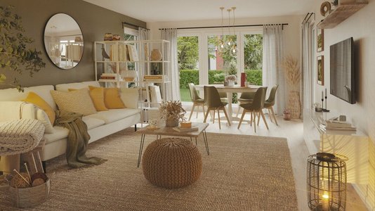 Offener Wohnbereich im Bungalow 128 mit gemütlichem Wohnzimmer, angrenzendem Essbereich und bodentiefen Fenstern mit Blick in den Garten